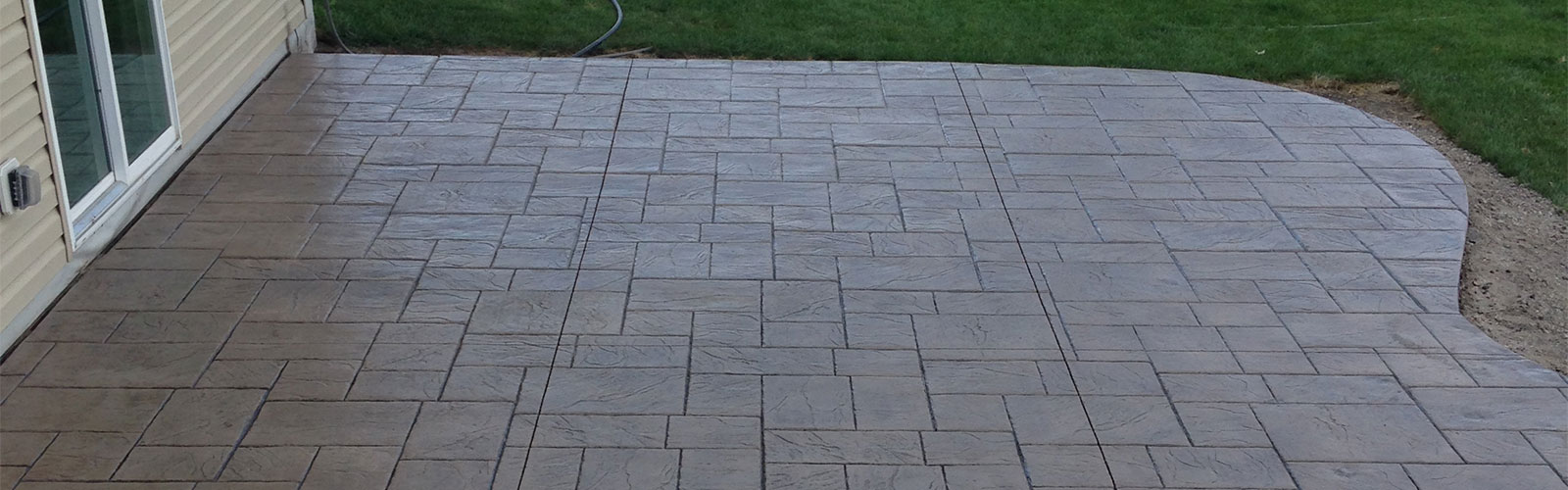Stamped concrete patio, installed by Creative Concrete