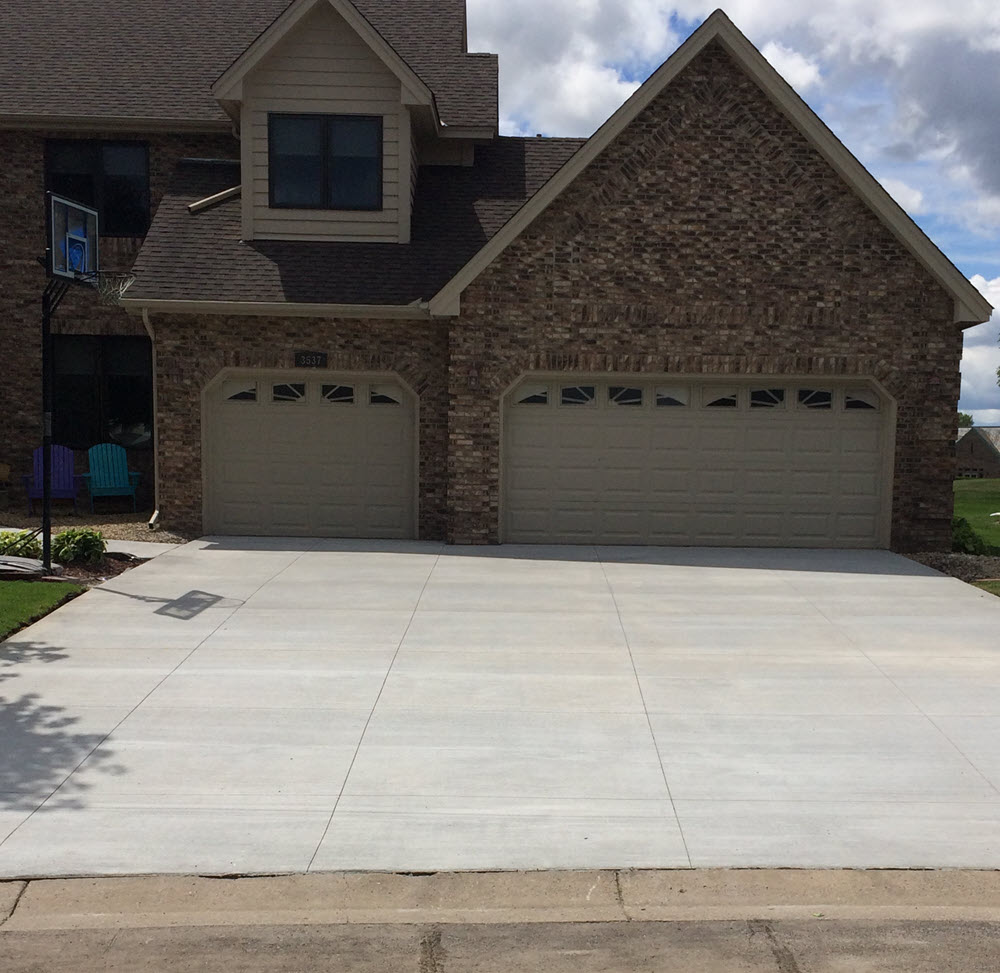 Concrete driveway poured by Creative Concrete Concrete driveway poured by Creative Concrete
