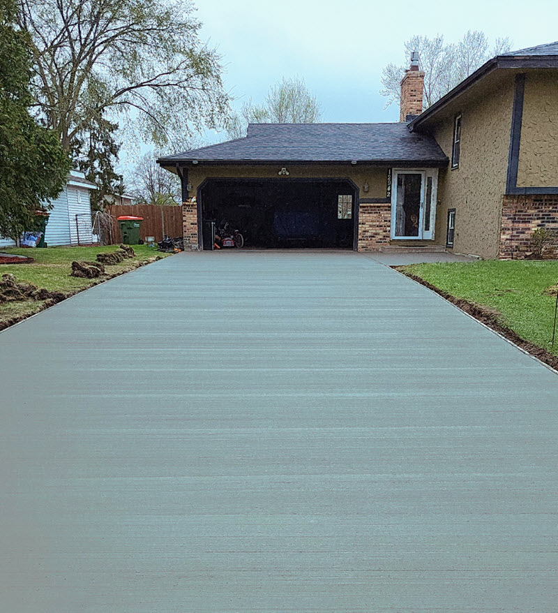 Concrete driveway installed in Blaine MN by Creative Concrete Inc Concrete driveway installed in Blaine MN by Creative Concrete Inc