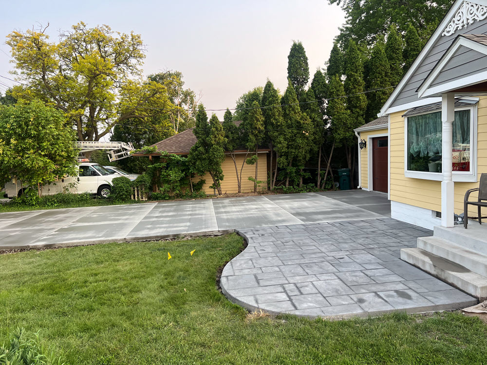 Stamped concrete patio and driveway, installed in Rosevilla by Creative Concrete Stamped concrete patio and driveway, installed in Rosevilla by Creative Concrete