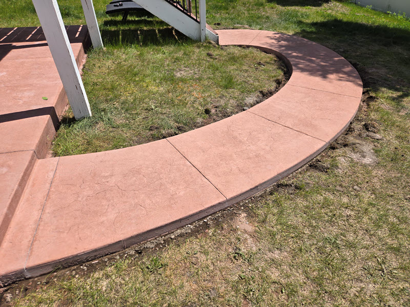 Stamped concrete walkway installed in Brooklyn Park MN by Creative Concrete Inc