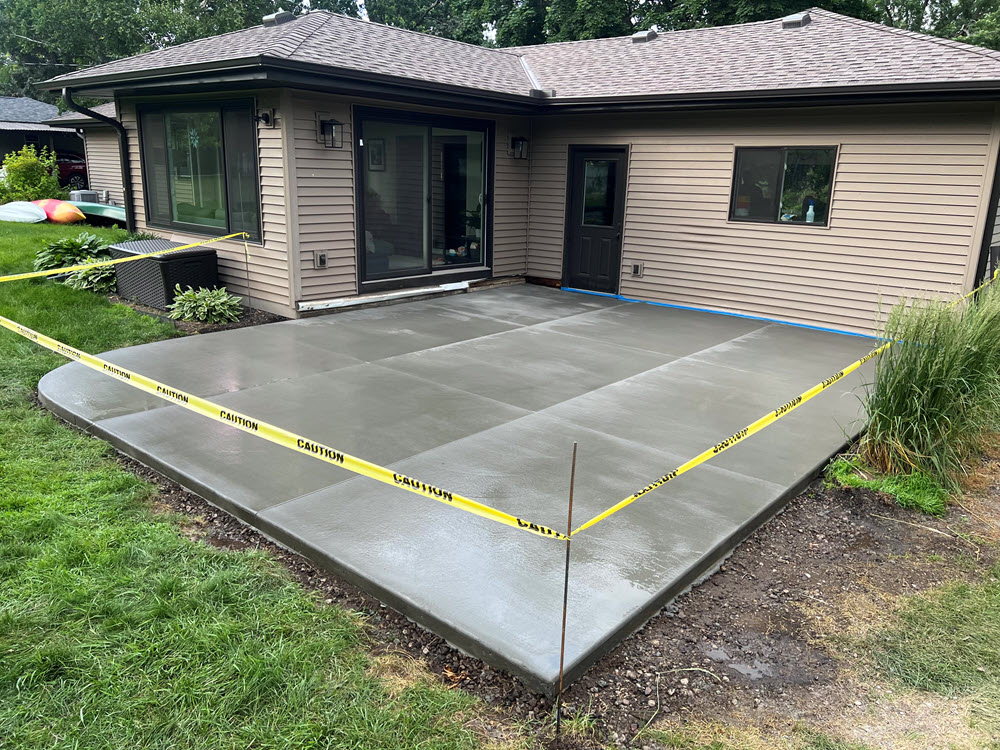 New concrete patio at Golden Valley home by Creative Concrete Inc