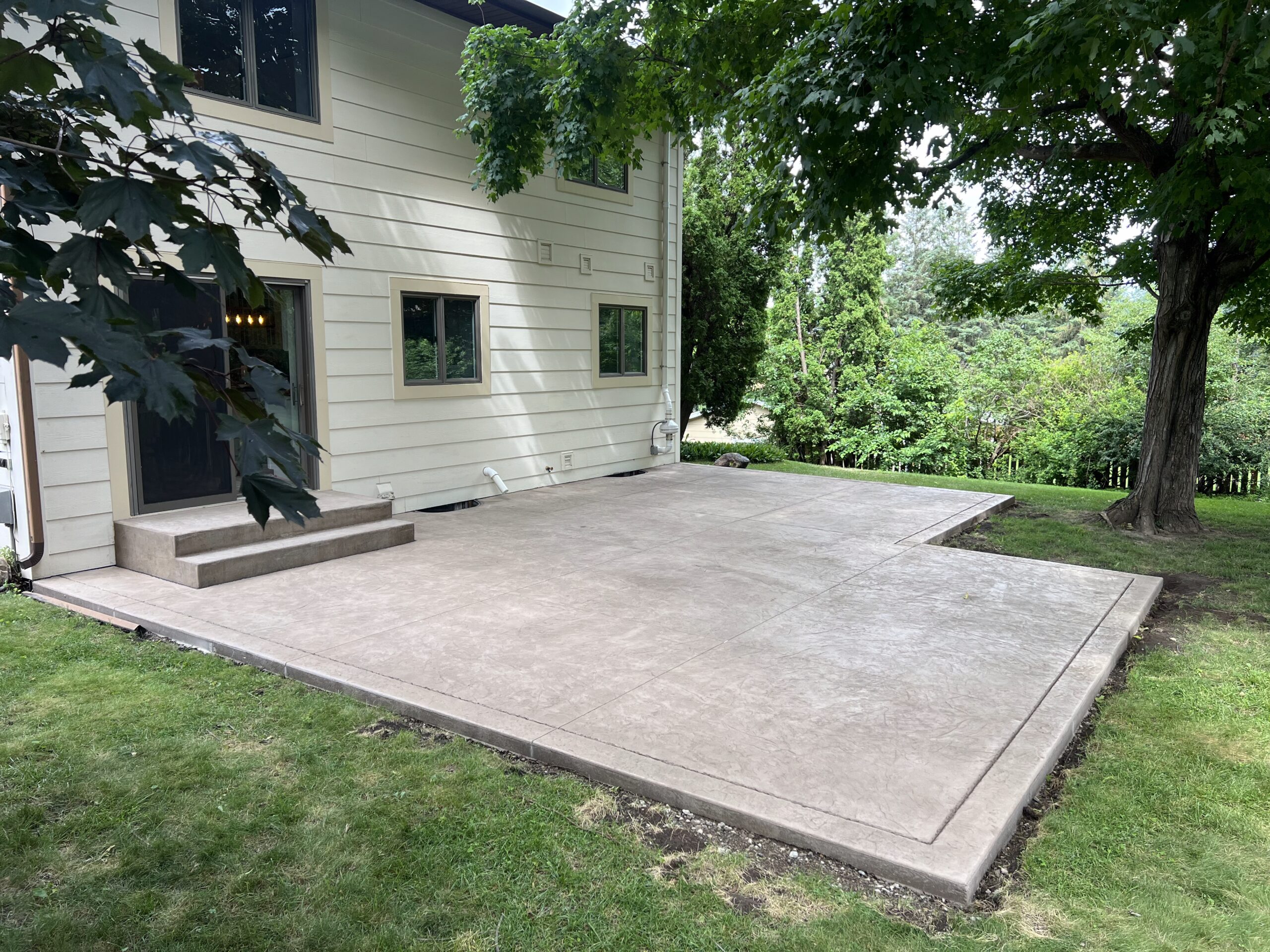 Stamped concrete patio installed in Bloomington by Creative Concrete Inc Stamped concrete patio installed in Bloomington by Creative Concrete Inc