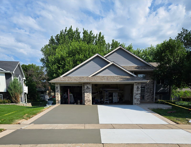 Concrete driveway installed in Blaine MN by Creative Concrete Inc