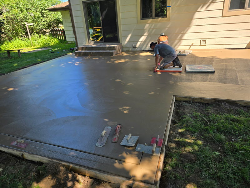 In-progress stamped concrete patio installation in Bloomington MN by Creative Concrete Inc In-progress stamped concrete patio installation in Bloomington MN by Creative Concrete Inc