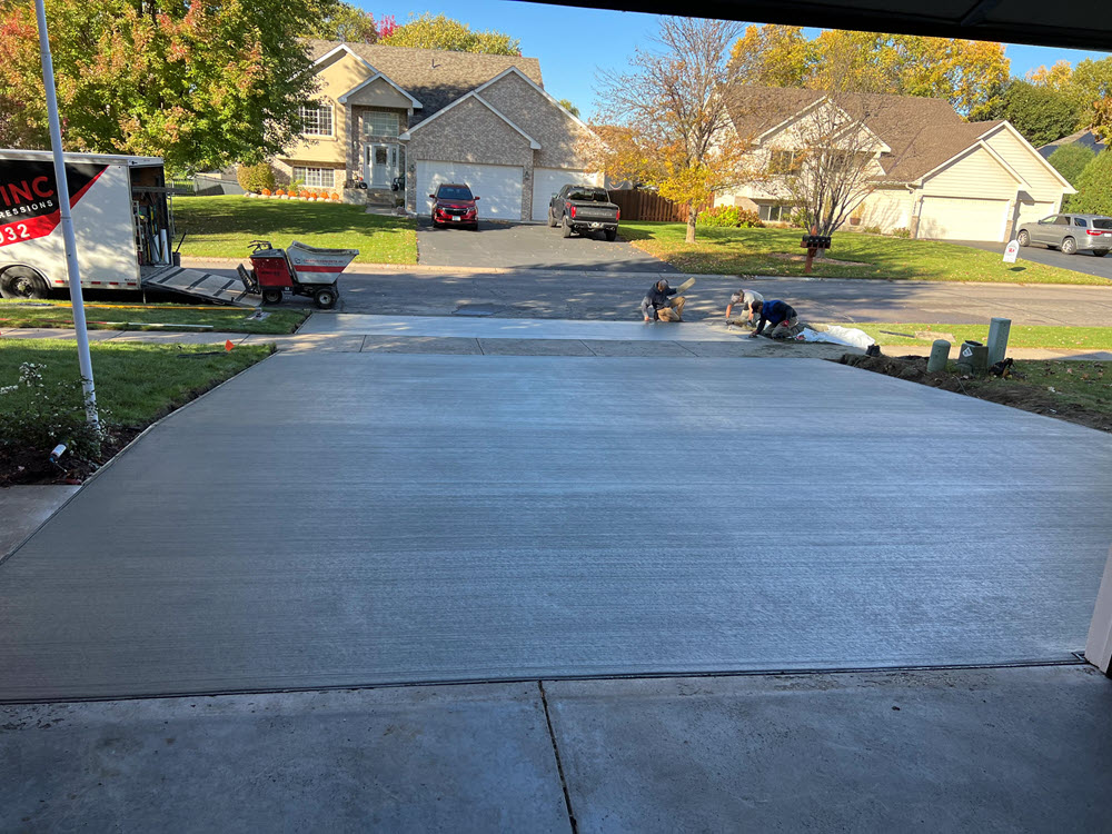 Poured concrete driveway in Champlin MN by Creative Concrete Inc