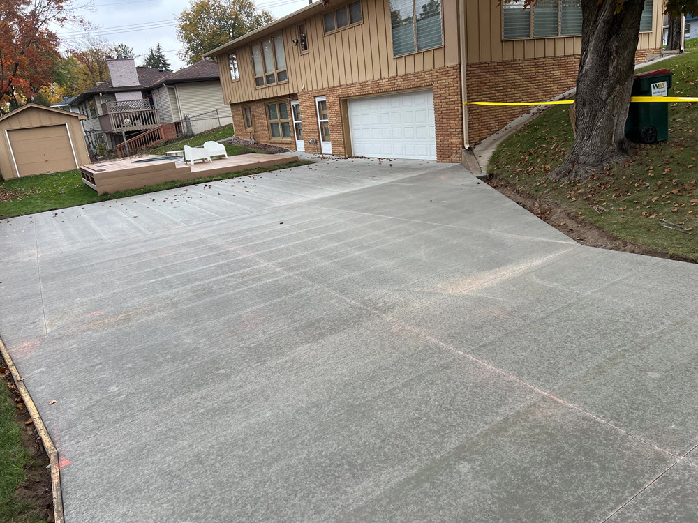Poured concrete driveway in Columbia Heights MN by Creative Concrete Inc Poured concrete driveway in Columbia Heights MN by Creative Concrete Inc