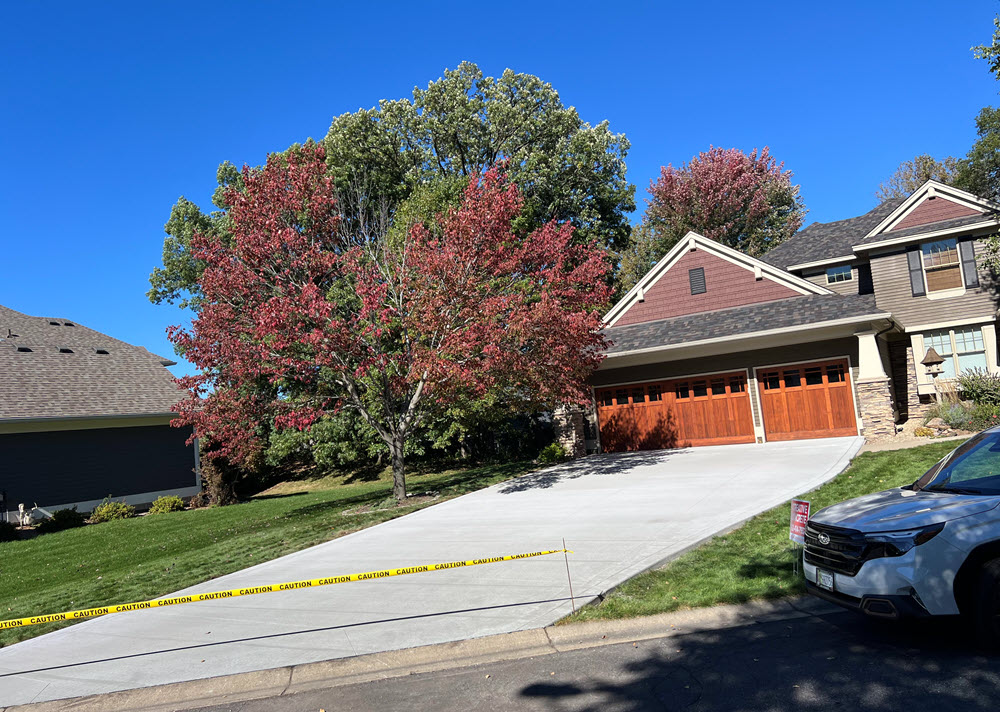 Poured concrete driveway installed in Mahtomedi MN by Creative Concrete Inc Poured concrete driveway installed in Mahtomedi MN by Creative Concrete Inc