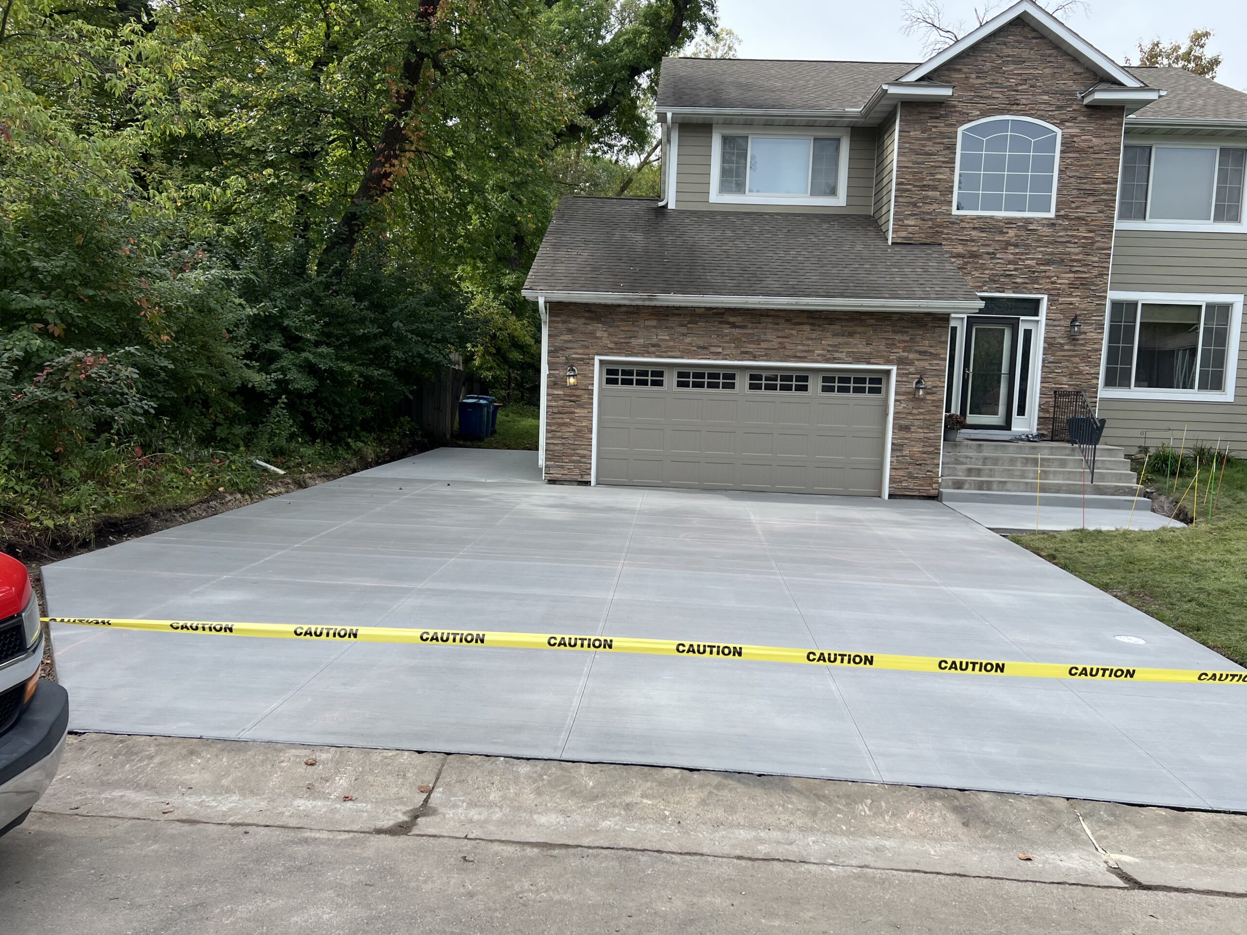 Poured concrete driveway installed in Plymouth MN by Creative Concrete Inc