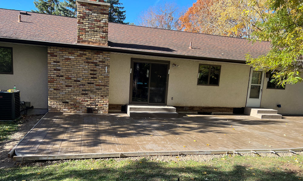 Wood-patterned stamped concrete driveway installed in Vadnais Heights MN by Creative Concrete Inc Wood-patterned stamped concrete driveway installed in Vadnais Heights MN by Creative Concrete Inc
